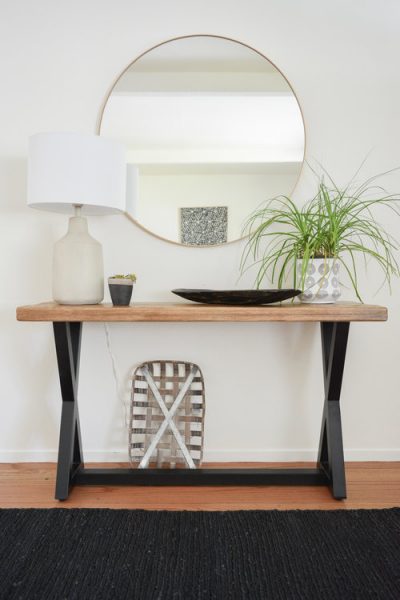 entryway, console table, round mirror