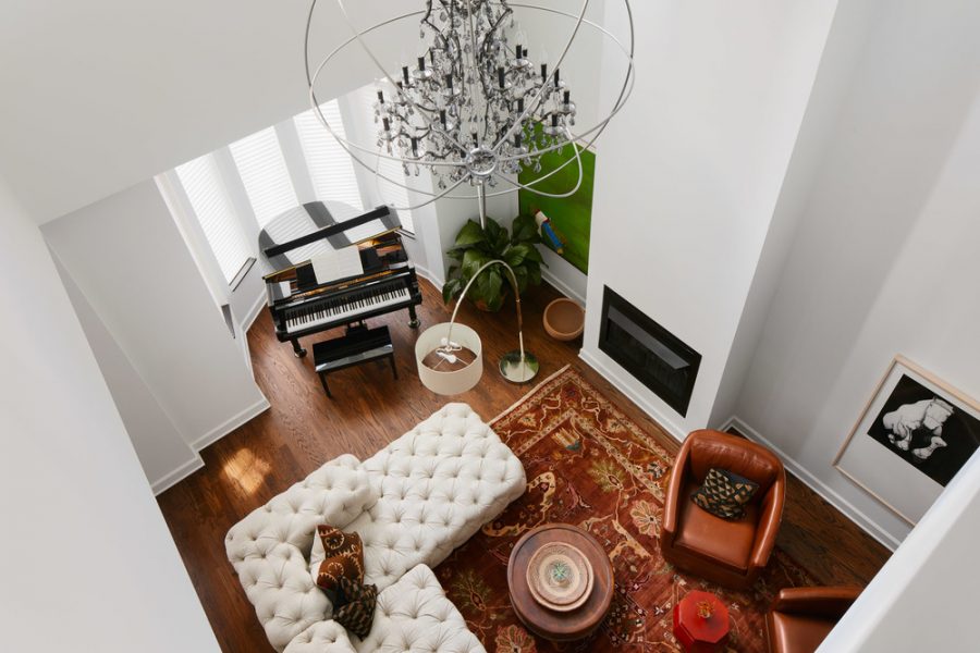 leather chairs and tufted sofa