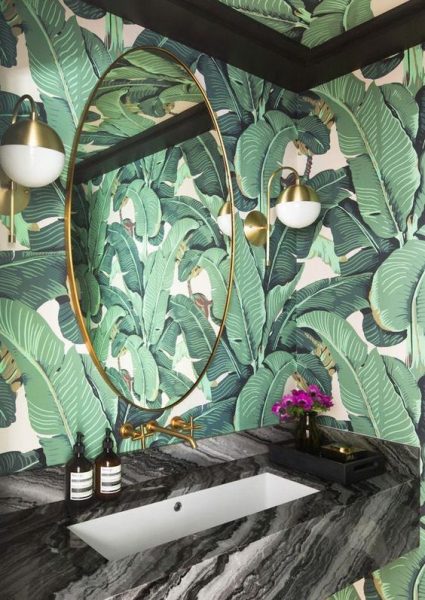 bathroom wallpaper, palm leaf wallpaper, green wallpaper, nature wallpaper, plants wallpaper, bathroom vanity, gold mirror, gold light sconces