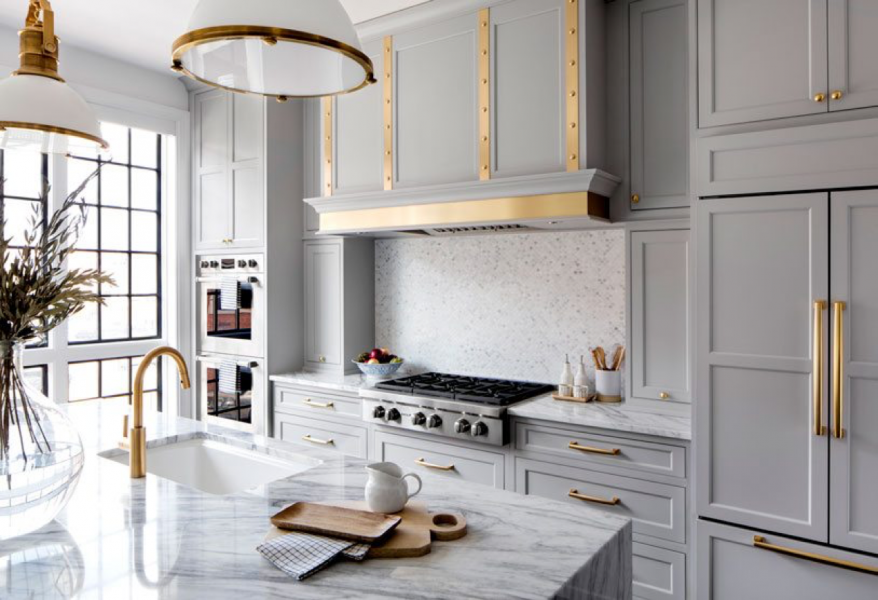 grey kitchen cabinets with brass